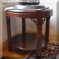 F06. Drexel Heritage banded mahogany round side table. 22"h x 25"w 